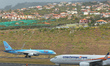 (Left-Right) TUI Airways plane, the world's largest charter airline, and SmartWings, a Cze...