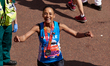 Adele Roberts at the finish line during the Virgin Money London Marathon in London, Englan...