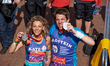 Andy Goldstein (R) poses for a photo ahead of participating in The Virgin London Marathon...