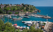 Tourism boats and ships dock in the Roman Harbor in Kaleici, the historic old city of Anta...