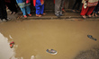 Shoes and slippery of Nepalese female devotees left during pulling the chariot of the Rato...