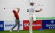 (140928) -- INCHEON, Sept. 28, 2014 () -- Guan Tianlang (R) of China warms up during the g...