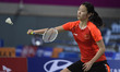 (140928) -- INCHEON, Sept. 28, 2014 () -- Li Xuerui of China returns the shuttlecock durin...