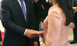Ri Sol Ju (R), wife of North Korea's leader Kim Jong Un is greeted by South Korea's Presid...