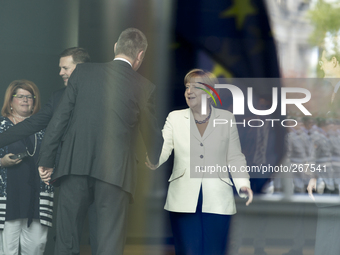 Angela Merkel, German chancellor, welcomes the  Prime Minister of Finland, Alexander Stubb, with military honors at the German chancellery o...