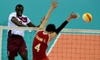 (141001) -- INCHEON, Oct. 1, 2014 () -- Zhang Chen (R) of China blocks during the men's vo...
