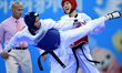 (141002) -- INCHEON, Oct. 2, 2014 () -- Guo Yunfei (R) of China fights during the women's...