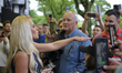 Tomi Lahren, conservative political commentator and Fox News contributor greets fans waiti...