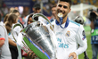 Marco Asensio of Real Madrid celebrates with the trophy after his side won the UEFA Champi...