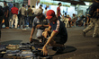 Costumers are shopping for jeans in a flea market in Kuala Lumpur, Malaysia, on 10 June 20...
