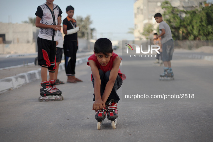 Palestinian children playing roller-skating in Nuseirat refugee camp