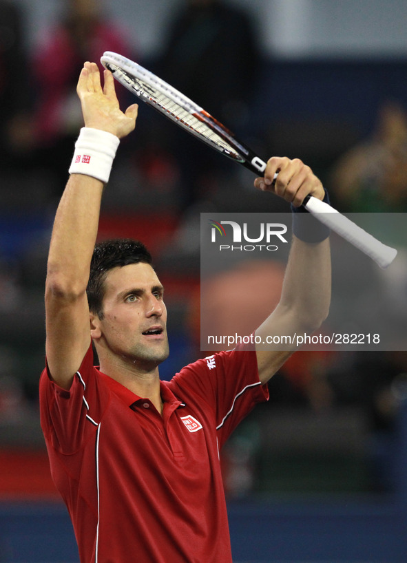 (141009) -- SHANGHAI, Oct. 9, 2014 () -- Serbia's Novak Djokovic celebrates after the men's singles third round match against Kazakhstan's M...