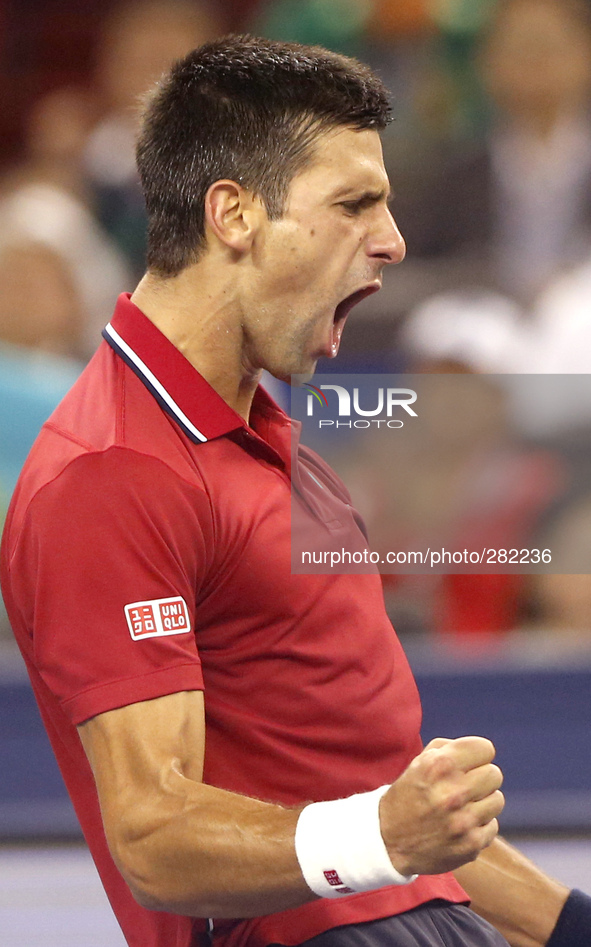 (141009) -- SHANGHAI, Oct. 9, 2014 () -- Serbia's Novak Djokovic celebrates after the men's singles third round match against Kazakhstan's M...