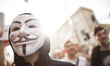 Man in Anonymous mask during protest against ACTA 2.0 in Warsaw in Warsaw on June 29, 2018...