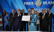 Former US mayor of New York Rudy Giuliani with Iran's opposition leader Maryam Rajavi as t...