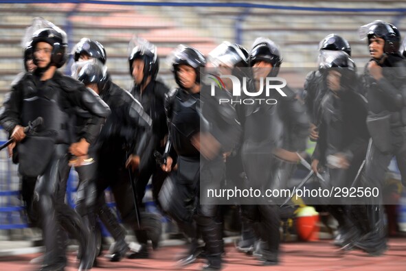 Members of the Egyptian security forces  guard during a nations group G qualifying soccer match between Egypt and Botswana of the African Cu...