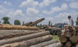 Kashmiri lumberjacks  load tree logs onto a logging truck at Timber Transport Range on Jul...