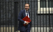 Britain's Secretary of State for Health Matt Hancock leaves Downing Street as he attended...