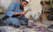 An Afghan blacksmith works at his shop in Jalalabad Capital of Nangarhar province on Octob...