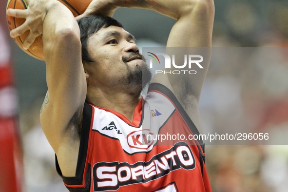 Bocaue, Bulacan Philippines - Manny Pacquiao of Kia warms up before their game against Blackwater on the 40th season opening of the Philippi...