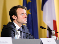 French Economy and Industry Minister Emmanuel Macron reacts during a press conference with German Finance Minister Wolfgang Schaeuble, Germa...