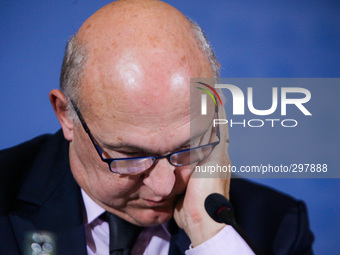 French Finance Minister Michael Sapin reacts during a press conference with German Finance Minister Wolfgang Schaeuble, German Vice Chancell...