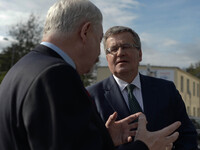 Polish President, Bronisław Komorowski (Right), chats with Jacek Majchrowski, the Mayor of Krakow, as he leaves ICE Krakow Cenetr after he m...