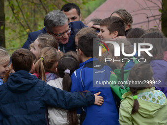 Polish President Bronislaw Komorowski pictured with local school children during his visit at the Benedictine Abbey in Tyniec. Vistula Boule...