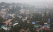 Thick fog covers the city of Thiruvananthapuram (Trivandrum), Kerala, India during the mon...