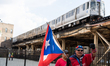 Demonstrators march down Clark Street towards Wrigley Field in a protest against gun viole...