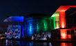 The German government buildings across the river Spree are pictured during a light show as...