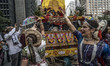 People participate in the annual Hindu festival "Ratha Yatra", in Sao Paulo, Brazil, on Au...