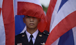 Thai Royal Army members stand to attention during celebrate the Queens Sirikit' 86th birth...