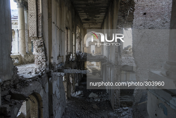 Pics taken on October 24, 2014. Ruined corridor of Darul Aman Palace during Mujahideen factions fought for control of Kabul in the early 199...