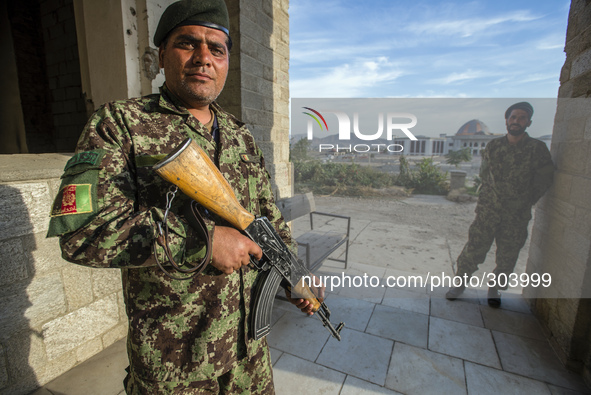 Pics taken on October 24, 2014. Guard of Darul Aman Palace, ruined during Mujahideen factions fought for control of Kabul in the early 1990s...