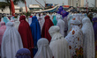 Muslim faithfuls attend a prayer as part of the Eid al-Adha celebrations at the centuries-...