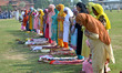 Kashmiri Muslims offer Eid-ul-Adha festival Prayers, in Srinagar, the summer capital city...