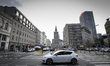 A Seat Leon is seen passing through the center of Warsaw, Poland with the iconic Palace of...