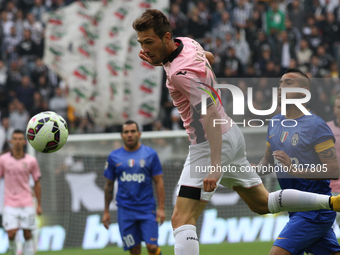 Palermo midfielder Franco Vazquez (20) reaches for the ball during the Serie A football match n.8 JUVENTUS - PALERMO on 26/10/14 at the Juve...