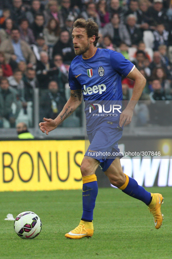 Juventus midfielder Claudio Marchisio (8) in action during the Serie A football match n.8 JUVENTUS - PALERMO on 26/10/14 at the Juventus Sta...