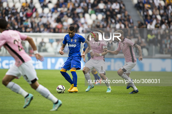  Roberto Pereyra, Edgart Barreto and Luca Rigoni during the Serie A match betweenJuventus FC and U.S Palermo at Juventus Stafium  on october...