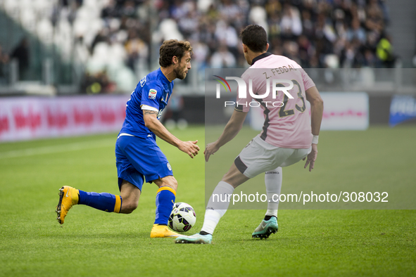  Claudoi Marchisio and Zouhair Feddal during the Serie A match betweenJuventus FC and U.S Palermo at Juventus Stafium  on october 26, 2014 i...