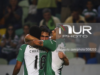 Sporting´s defender Paulo Oliveira (C) celebrates with team mates after scoring a goal during the Portuguese League football match between S...