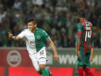 Sporting's forward Fredy Montero (L)  celebrates his goal (3-2) during the Portuguese League  football match between Sporting CP and CS Mari...