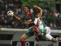 Sporting´s forward Fredy Montero (R) scores during the Portuguese League football match between Sporting CP and CS Maritimo at Jose Alvalade...