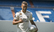 Mariano Diaz Mejia reacts on the pitch after being announced as a Real Madrid player at Sa...