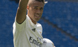 Mariano Diaz Mejia reacts on the pitch after being announced as a Real Madrid player at Sa...