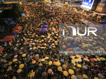 Protesters fill the streets as tens of thousands come to the main protest site one month after the Hong Kong police used tear gas to dispers...