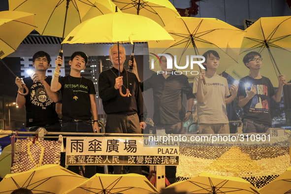 Protesters fill the streets as tens of thousands come to the main protest site one month after the Hong Kong police used tear gas to dispers...