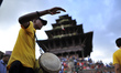 Nepalese devotees playing traditional instruments during Pancha Dan festival celebrated in...